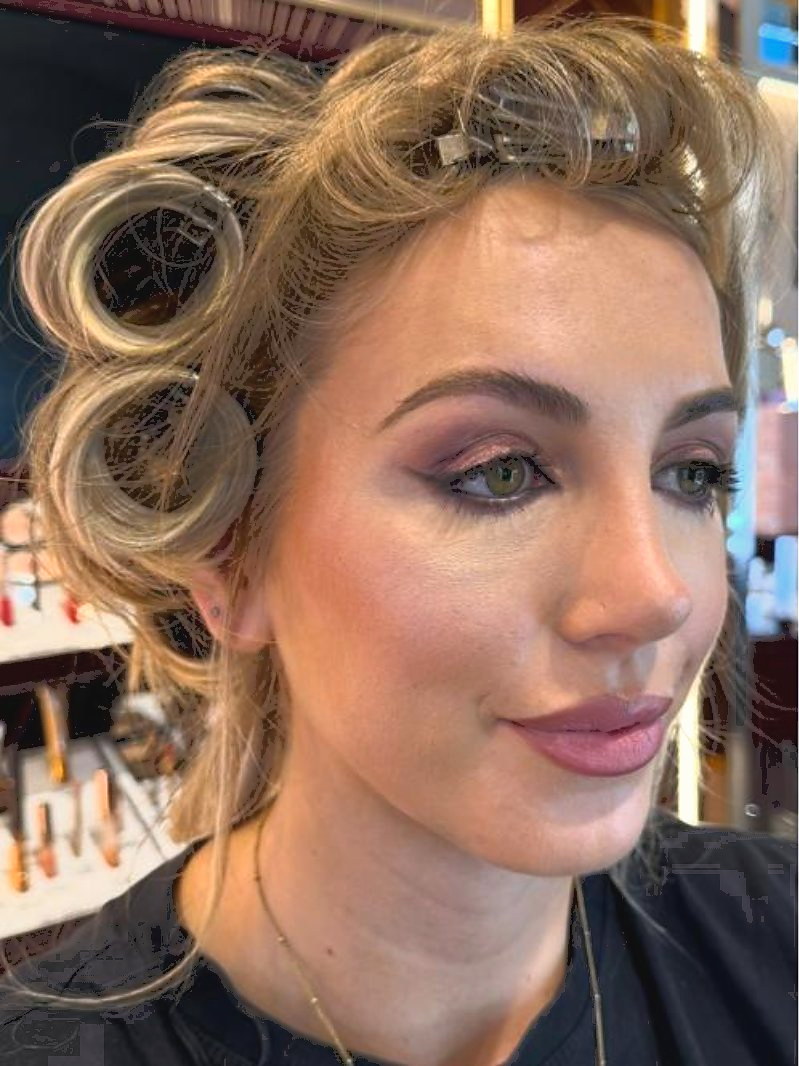 Soft glam makeup on a client