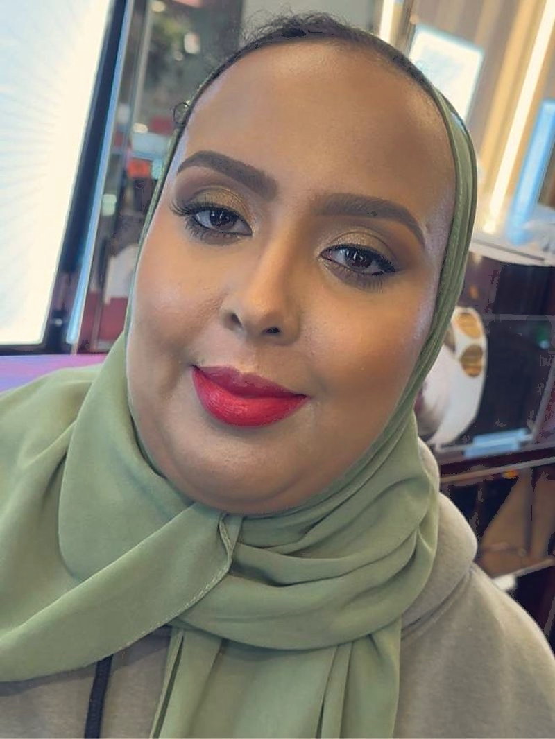 Makeup on a client wearing a green hijab